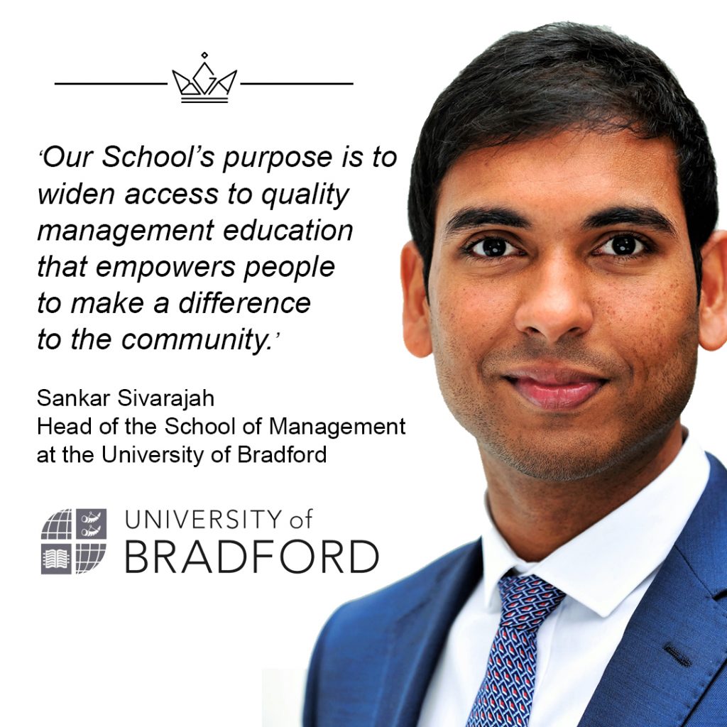 The Head of the School of Management at the University of Bradford smiling. The Head has black hair and dark eyes, wearing a smart white shirt and navy blue blazer with a patterned tie. The banner has the University of Bradford logo and a quote stating, 'Business School's purpose is to widen access to quality management education that empowers people to make a difference in the community'.