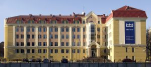 White building with red roof